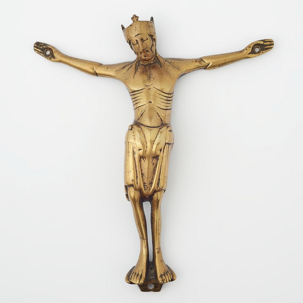  A rare French gilt copper and champlevé enamel book or Evangeliary cover depicting the Crucifixion