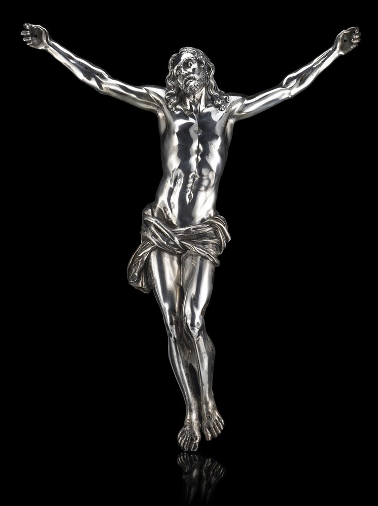 A silver sculpture of Crucified Christ