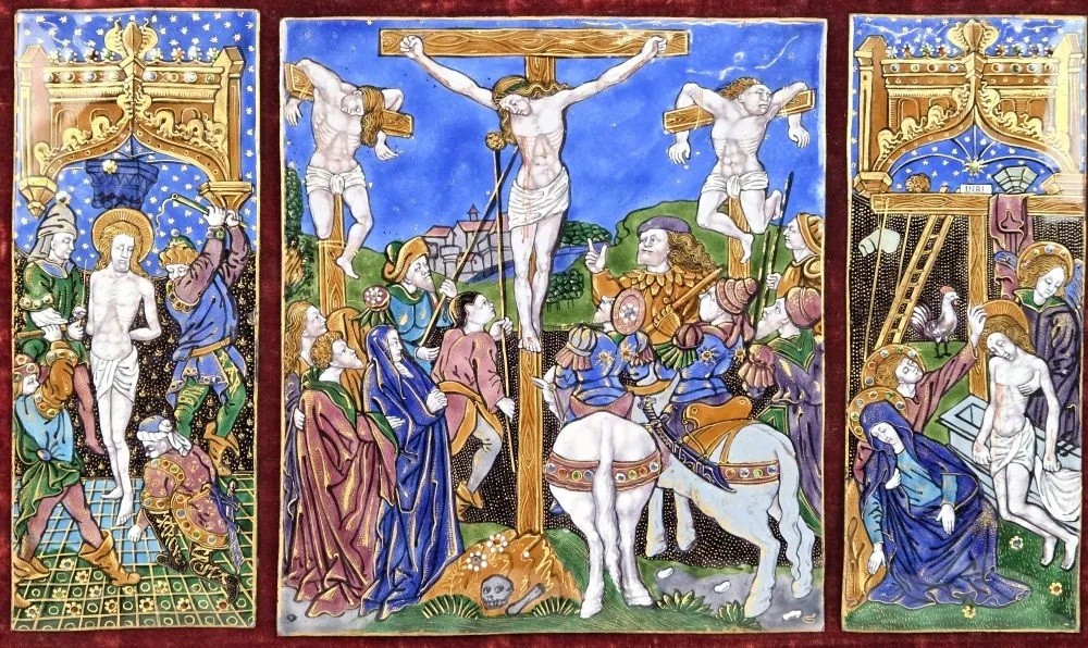 A triptych depicting the Passion of Christ including the flagellation of Christ, the Crucifixion, and the entombment of Jesus