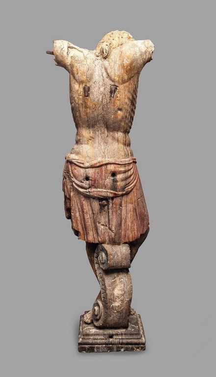 Importante statue en pierre marbrière de Vérone - Posée sur une console à volutes- Anciennes traces de polychromie- H : 1 m 55. -