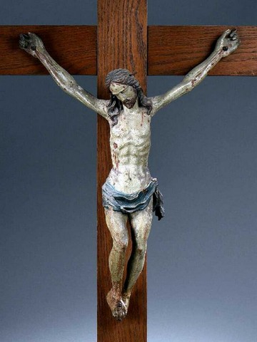 Christ en bois sculpté et polychromé. Tête inclinée, yeux clos, ceint d'un 